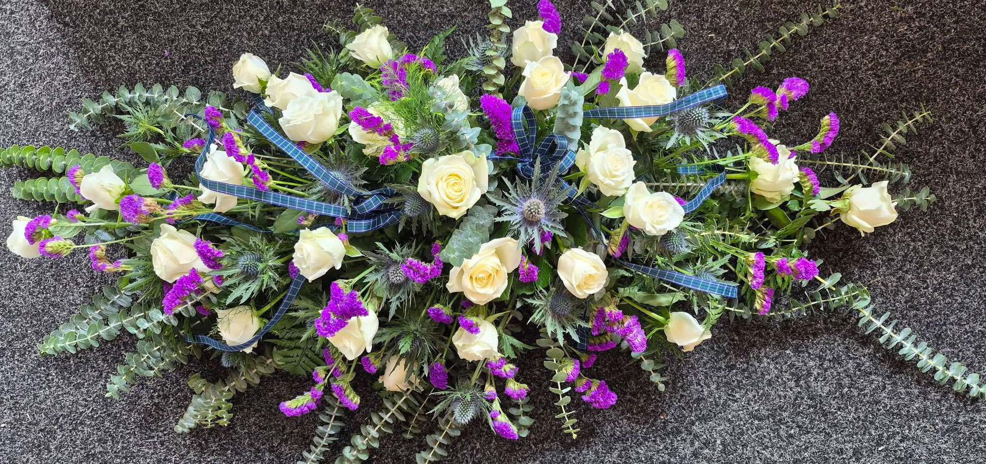 Funeral flowers from Thistle Du in Galston