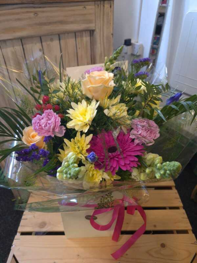 Rainbow Sherbet - A cheerful arrangement bursting with juicy pinks, sunny yellows and soft peach tones, finished with fresh greenery for a lively pop of colour.