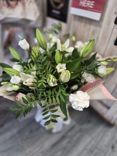 Simply White - An elegant white and green bouquet offering a fresh, timeless look for any occasion.