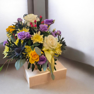 Sunshine & Lavender - A delightful arrangement in uplifting yellow and purple shades.
