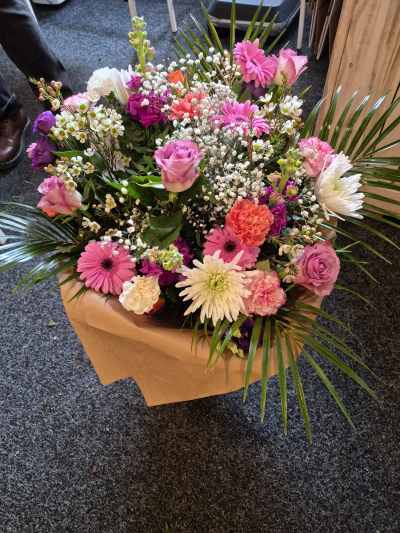 Blushing Wishes - A generous bouquet in pink, purple and white, perfect for celebrating someone special.