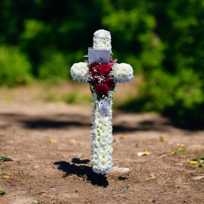 Cross - A traditional white cross with deep red accents, offering a meaningful final tribute.